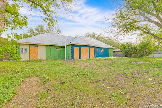 view of outdoor structure with fence