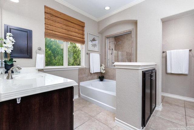 full bath with a tile shower, a garden tub, tile patterned flooring, and ornamental molding