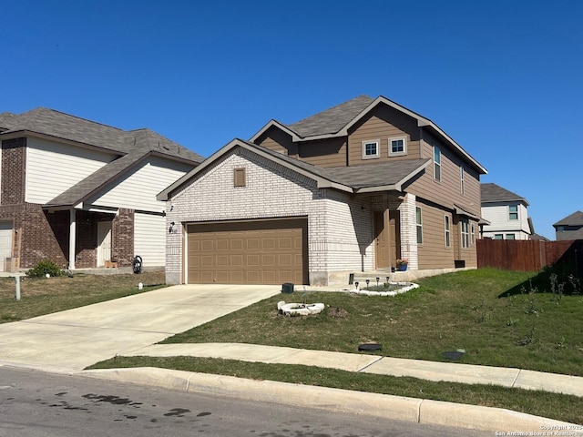 view of front of home with a front lawn, driveway, fence, a garage, and brick siding