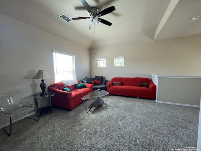 living room with vaulted ceiling, ceiling fan, baseboards, carpet flooring, and visible vents