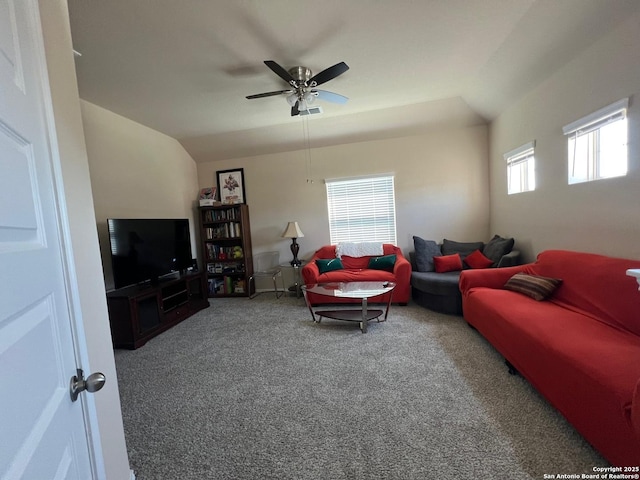 carpeted living area featuring a ceiling fan