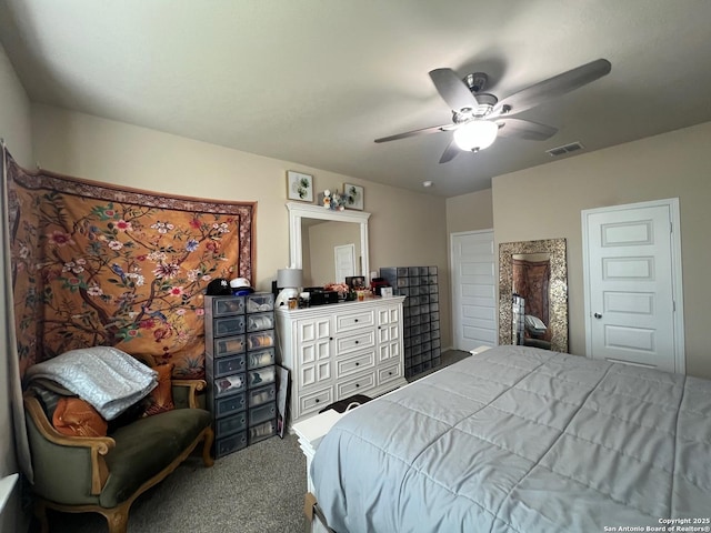 bedroom with a ceiling fan, carpet flooring, and visible vents