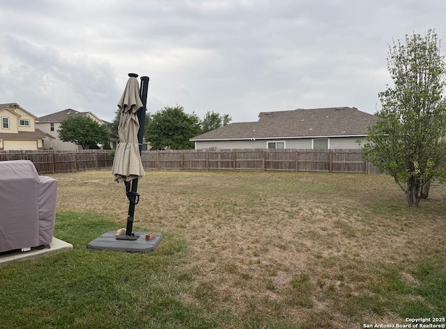 view of yard with fence