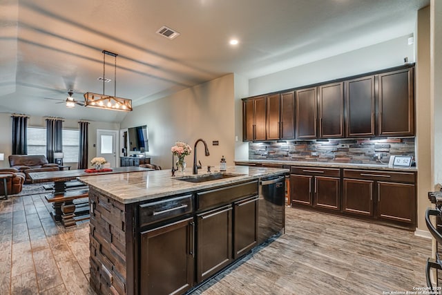 12177 Tower Frst, San Antonio, TX 78253 - kitchen with a sink, open floor plan, light wood-style floors, dishwasher, and visible vents