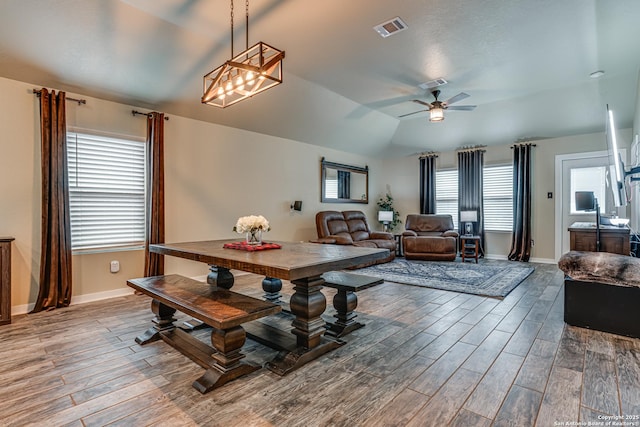 12177 Tower Frst, San Antonio, TX 78253 - dining space featuring baseboards, wood finished floors, visible vents, and ceiling fan