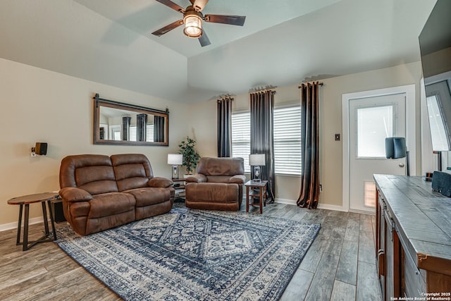 12177 Tower Frst, San Antonio, TX 78253 - living room featuring ceiling fan, baseboards, lofted ceiling, and wood finished floors