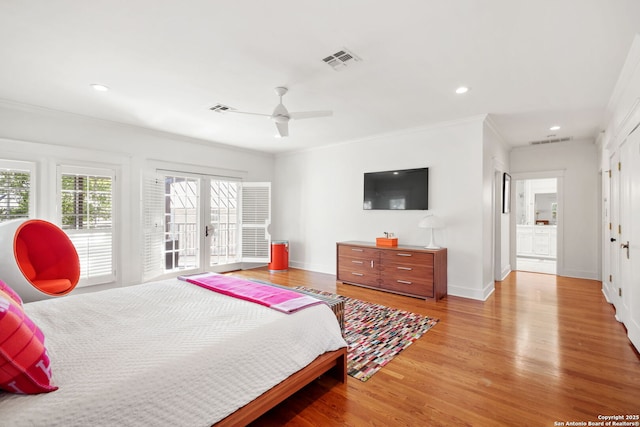 204 Parklane, Olmos Park, TX 78212 - bedroom featuring light wood finished floors, ornamental molding, french doors, a ceiling fan, and recessed lighting