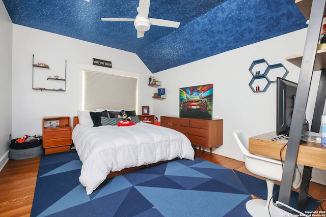 204 Parklane, Olmos Park, TX 78212 - bedroom with wood finished floors, vaulted ceiling, baseboards, and ceiling fan