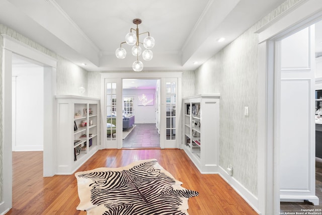 204 Parklane, Olmos Park, TX 78212 - entryway featuring hardwood / wood-style flooring, ornamental molding, french doors, wallpapered walls, and baseboards
