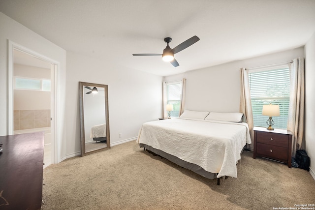 bedroom with baseboards, light colored carpet, and ceiling fan
