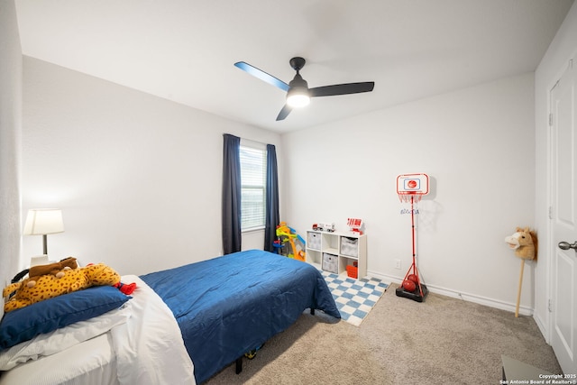 bedroom featuring carpet floors, baseboards, and ceiling fan