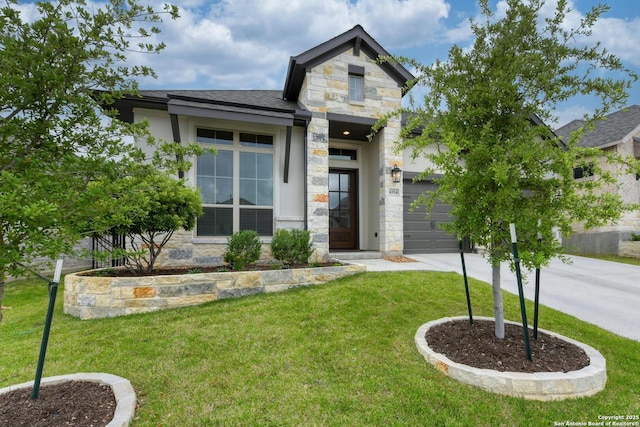view of front of house with an attached garage, stone siding, a front lawn, and concrete driveway