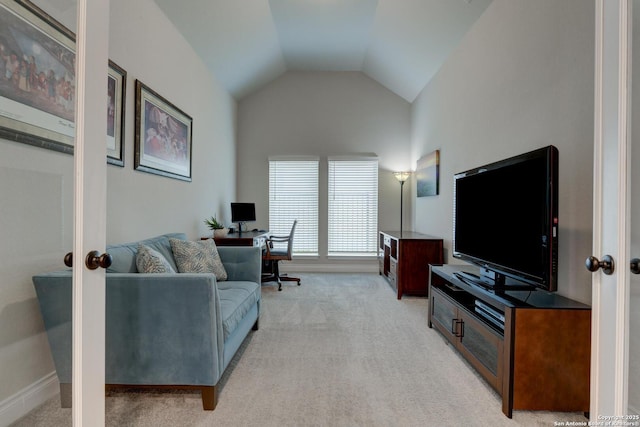 living room featuring lofted ceiling, baseboards, light carpet, and french doors