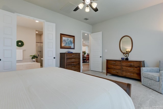 bedroom featuring recessed lighting, visible vents, light colored carpet, and connected bathroom