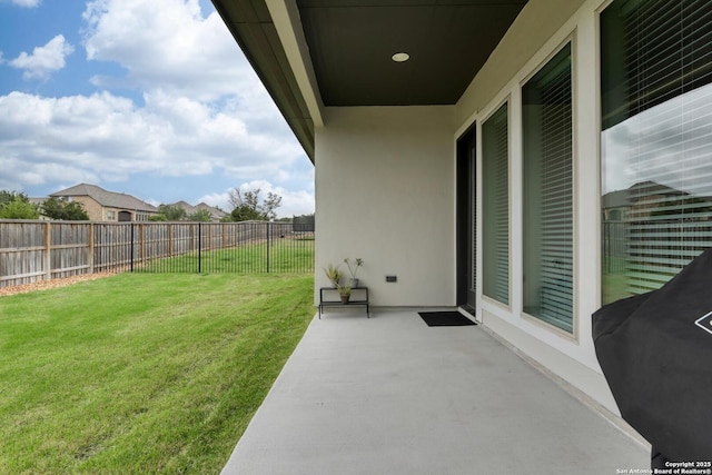 view of yard with a fenced backyard and a patio