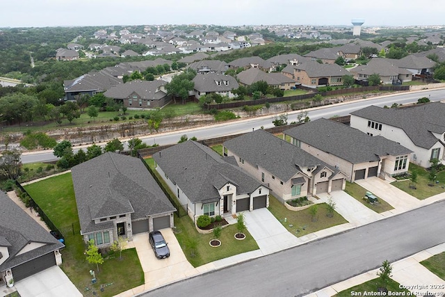 birds eye view of property featuring a residential view