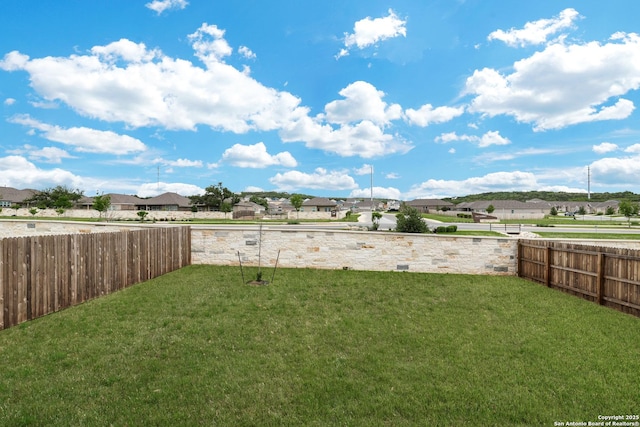 6057 Companion Loop, Bulverde, TX 78163 - view of yard with a fenced backyard and a residential view