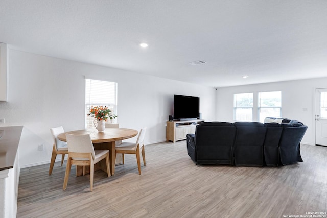 6057 Companion Loop, Bulverde, TX 78163 - living room with visible vents, light wood-style flooring, baseboards, and recessed lighting