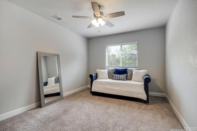 27314 Falls Cv, Boerne, TX 78015 - sitting room with carpet flooring, baseboards, visible vents, and ceiling fan