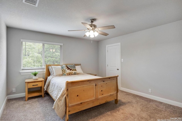 27314 Falls Cv, Boerne, TX 78015 - carpeted bedroom with baseboards, a ceiling fan, and visible vents