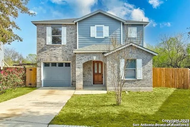 traditional-style house with fence, concrete driveway, an attached garage, and a front lawn
