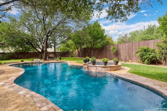 view of pool with a lawn, a fenced in pool, a fenced backyard, and a patio area
