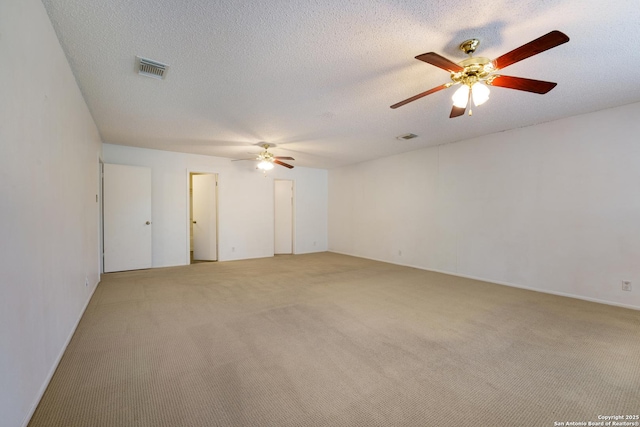 6635 Meadow Dawn, Converse, TX 78109 - unfurnished room with visible vents, ceiling fan, and light colored carpet