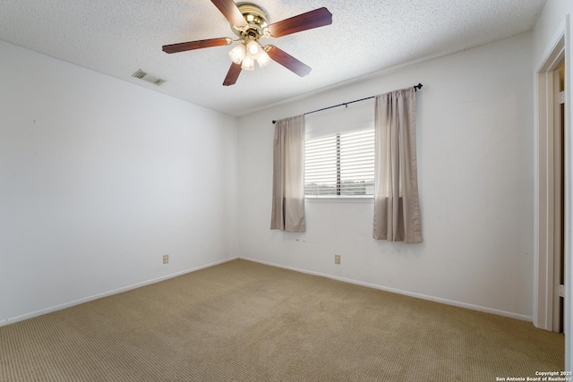 6635 Meadow Dawn, Converse, TX 78109 - spare room with baseboards, visible vents, ceiling fan, and light colored carpet