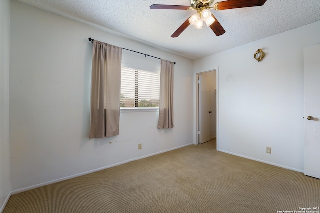 6635 Meadow Dawn, Converse, TX 78109 - carpeted spare room with a textured ceiling, ceiling fan, and baseboards