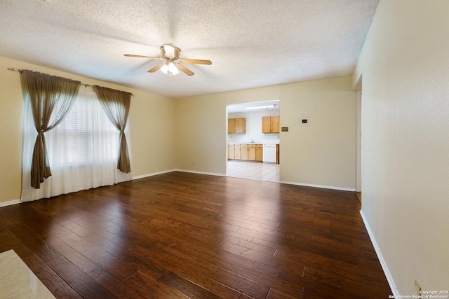 6635 Meadow Dawn, Converse, TX 78109 - empty room with wood-type flooring, a textured ceiling, ceiling fan, and baseboards