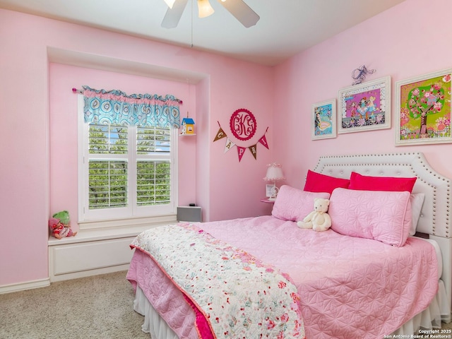 carpeted bedroom with a ceiling fan