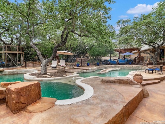 view of pool featuring fence, a patio, and a fenced in pool