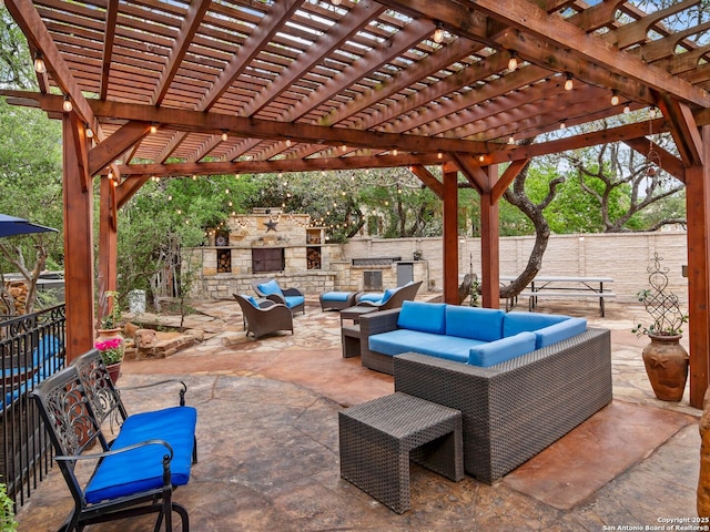 view of patio with fence, a pergola, and an outdoor hangout area