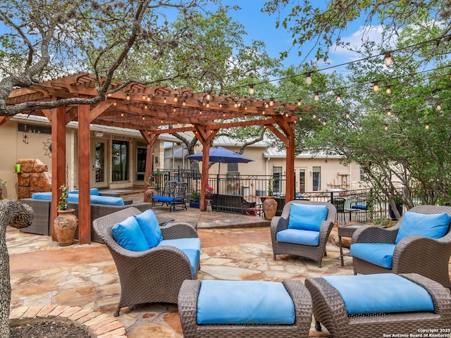 view of patio with fence and a pergola