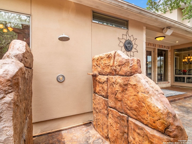 exterior details with stucco siding