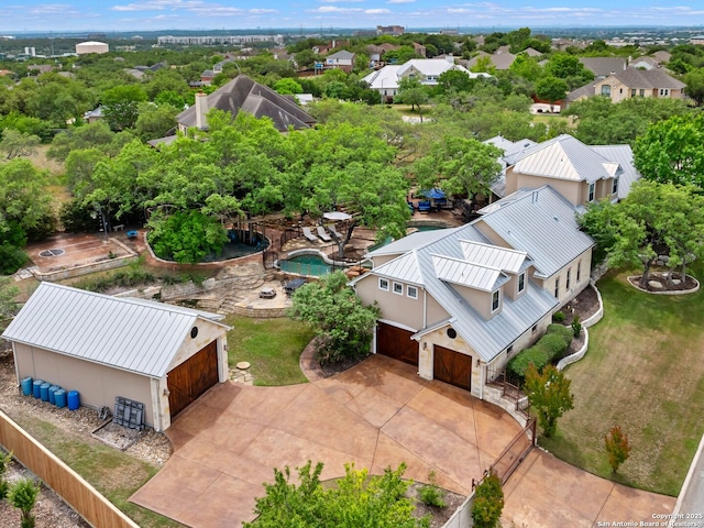 birds eye view of property with a residential view