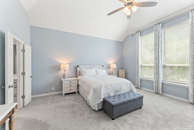 bedroom featuring ceiling fan, vaulted ceiling, carpet, and baseboards