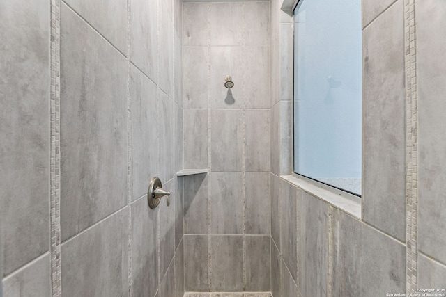 details with a tile shower