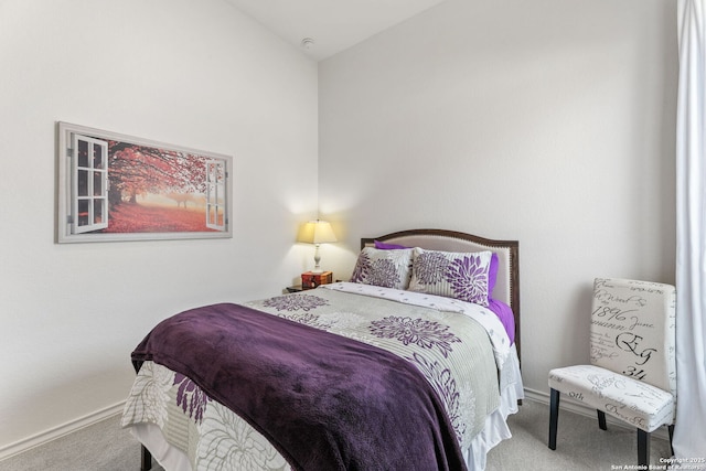 carpeted bedroom with baseboards