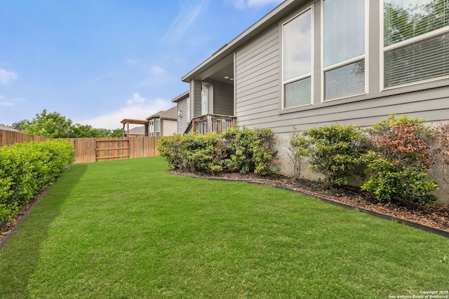 view of yard with fence