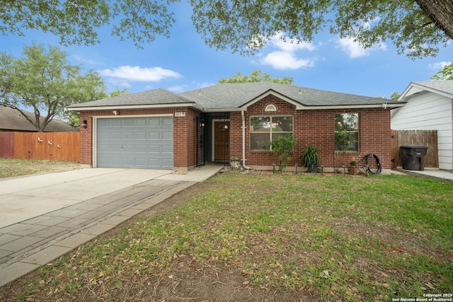 ranch-style house featuring a front yard, concrete driveway, a garage, and fence