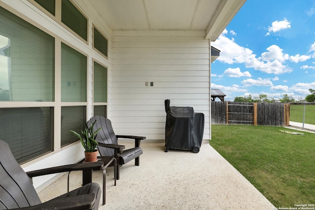 view of patio with fence