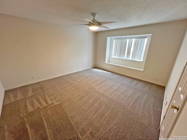 7514 Autumn Ledge, Converse, TX 78109 - carpeted spare room featuring a textured ceiling, ceiling fan, and baseboards