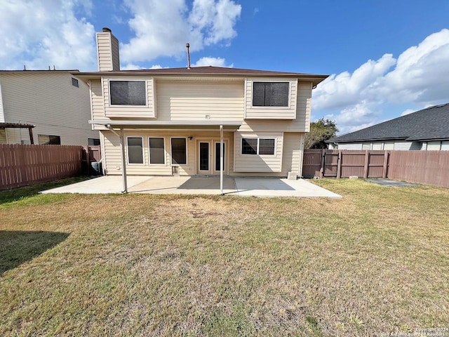 7514 Autumn Ledge, Converse, TX 78109 - rear view of property featuring a lawn, french doors, a patio, and a fenced backyard