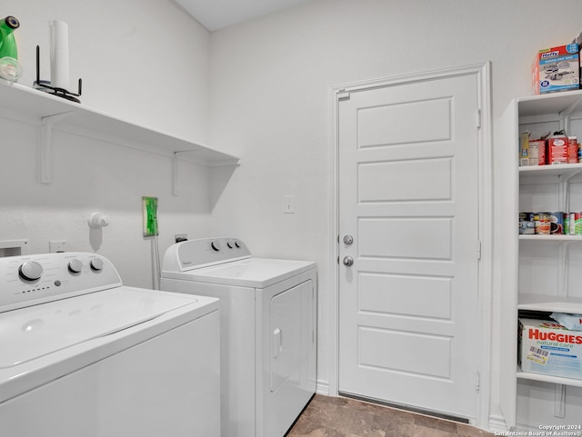 laundry room with laundry area and washing machine and dryer