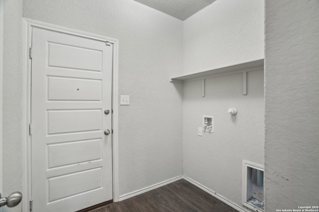 laundry room featuring washer hookup, hookup for a gas dryer, baseboards, dark wood finished floors, and laundry area