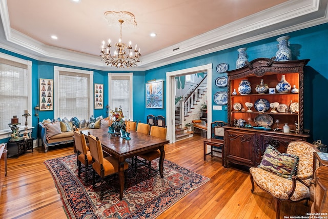 112 King William, San Antonio, TX 78204 - dining space with an inviting chandelier, crown molding, and wood-type flooring