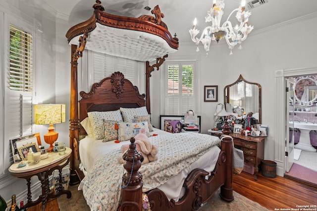 112 King William, San Antonio, TX 78204 - bedroom featuring visible vents, ornamental molding, wood finished floors, and a notable chandelier