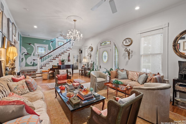 112 King William, San Antonio, TX 78204 - living area with wood finished floors, ceiling fan with notable chandelier, and crown molding