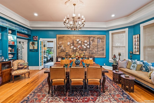 112 King William, San Antonio, TX 78204 - dining area with baseboards, ornamental molding, an inviting chandelier, and wood-type flooring